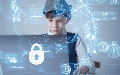 Boy in front of the computer screen in virtual space