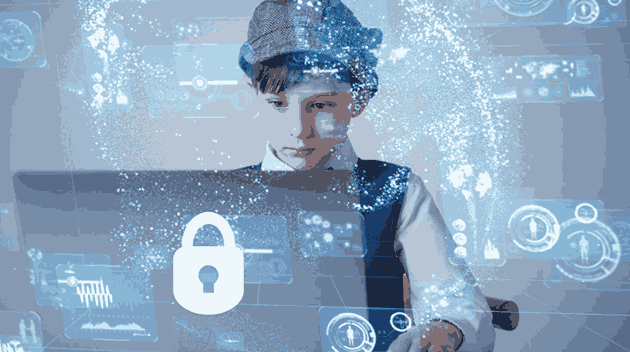 Boy in front of the computer screen in virtual space