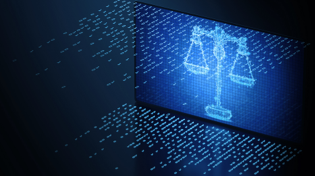 Scales of justice displayed on a large computer screen, thumbnail size